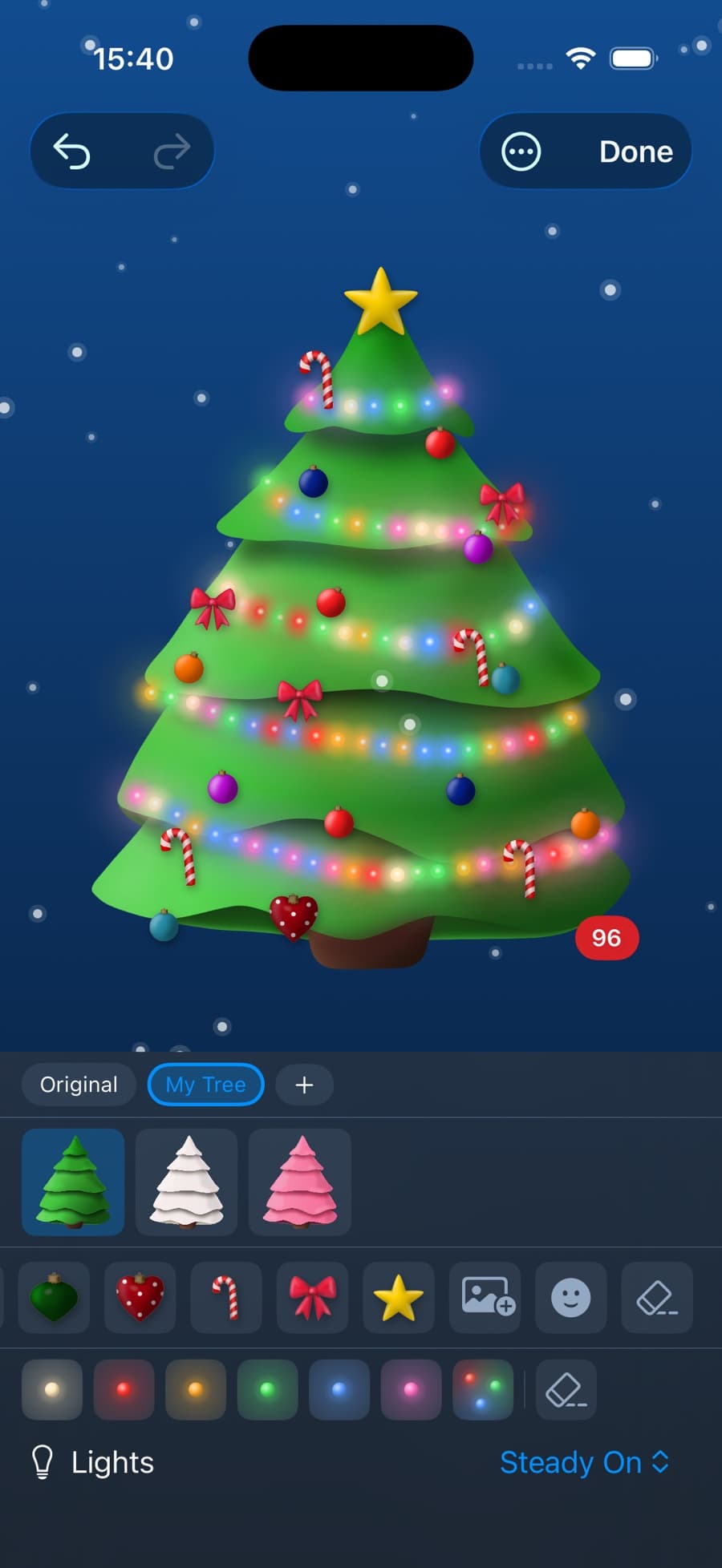 Decorating the tree on iPhone, with the ornament palette open