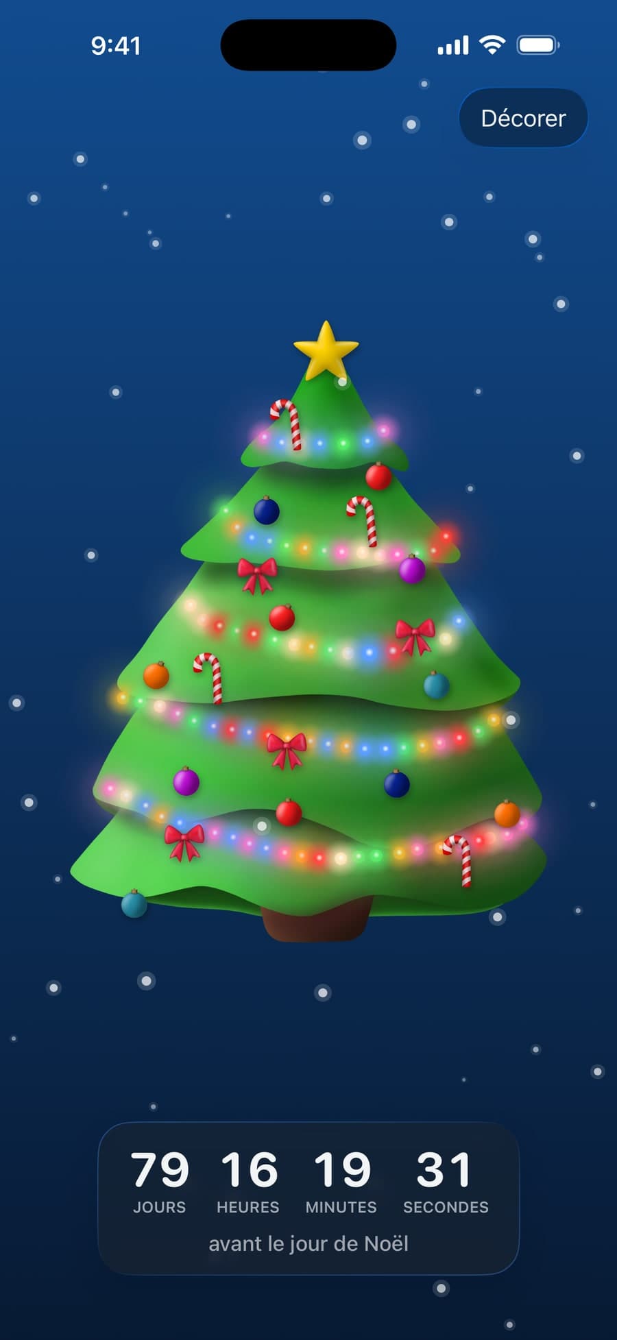 Le sapin décoré sur iPhone, sous la neige, avec le compte à rebours de Noël